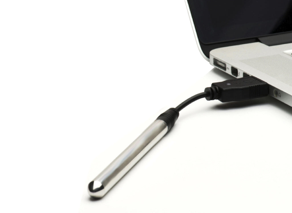 vesper personal massager silver charging
